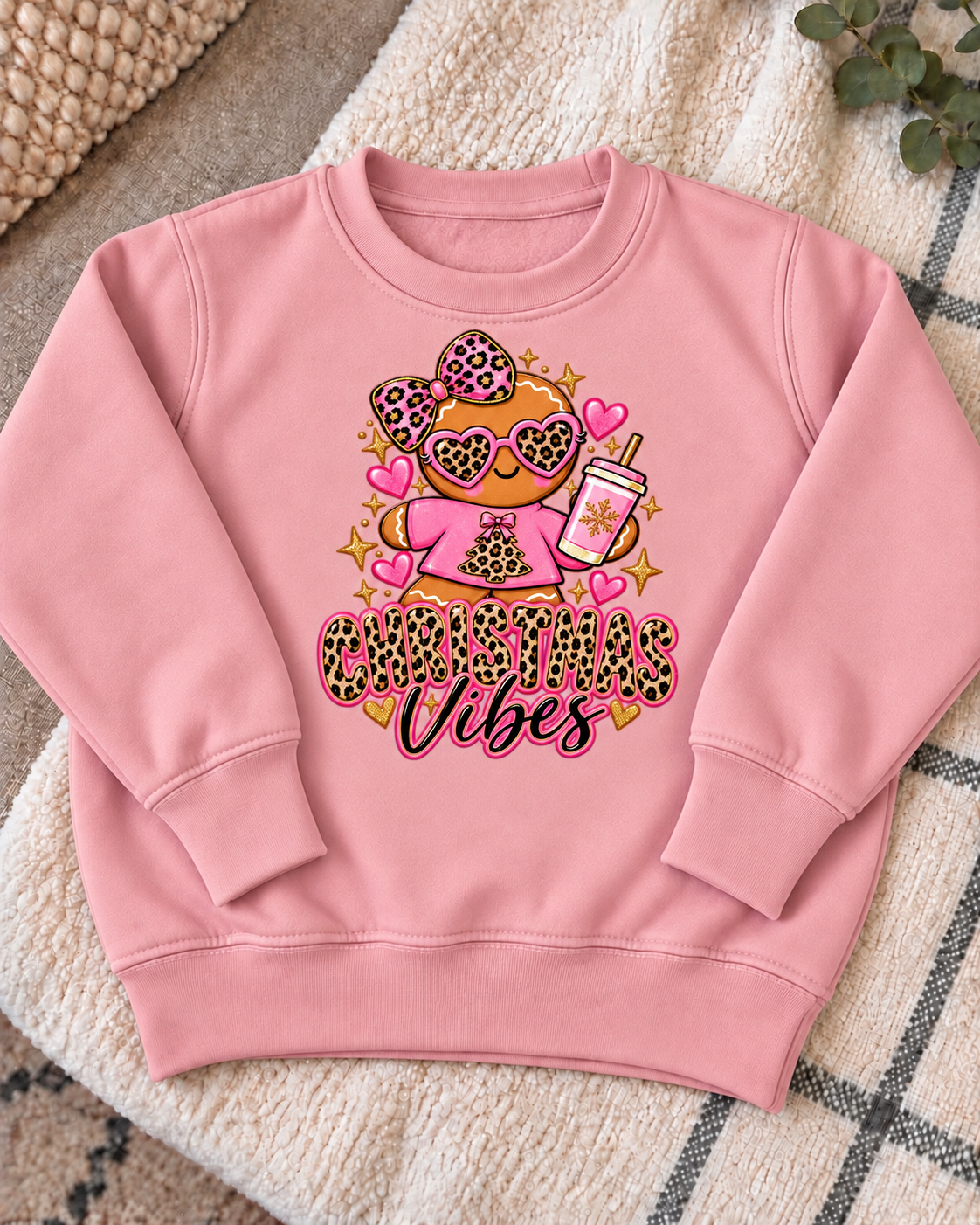 pink Christmas Vibes Gingerbread jumper with design centred on chest