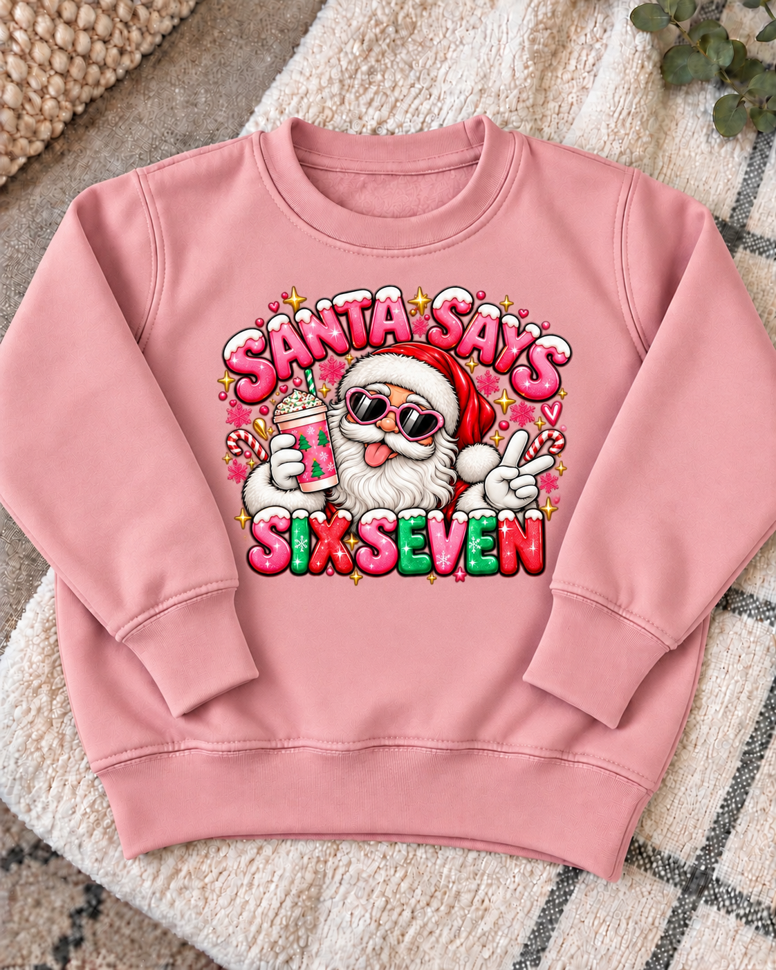 Pink Girly Santa Says Six Seven jumper, centred artwork