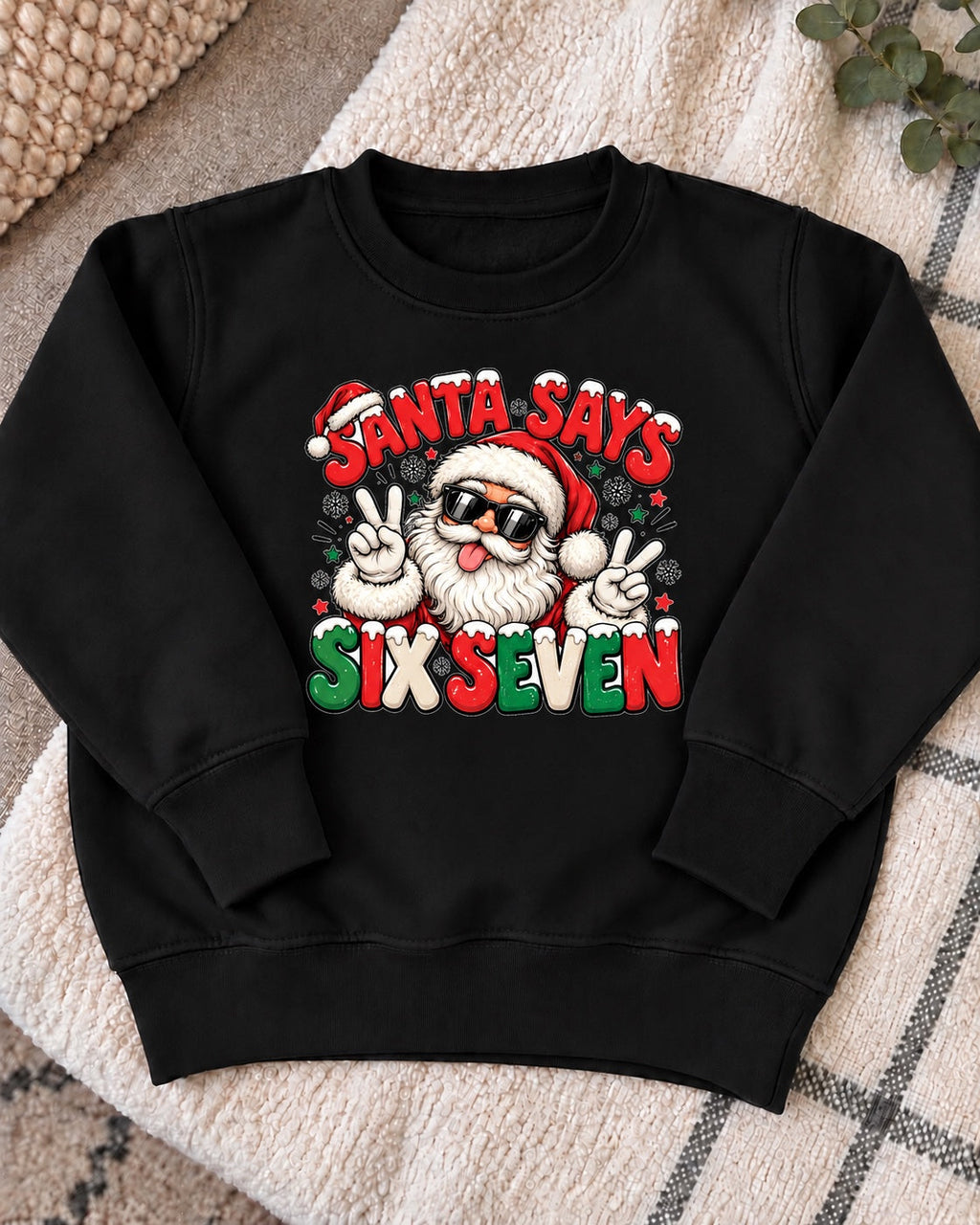Santa Says Six Seven jumper - black flat lay