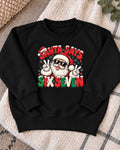 Santa Says Six Seven jumper - black flat lay