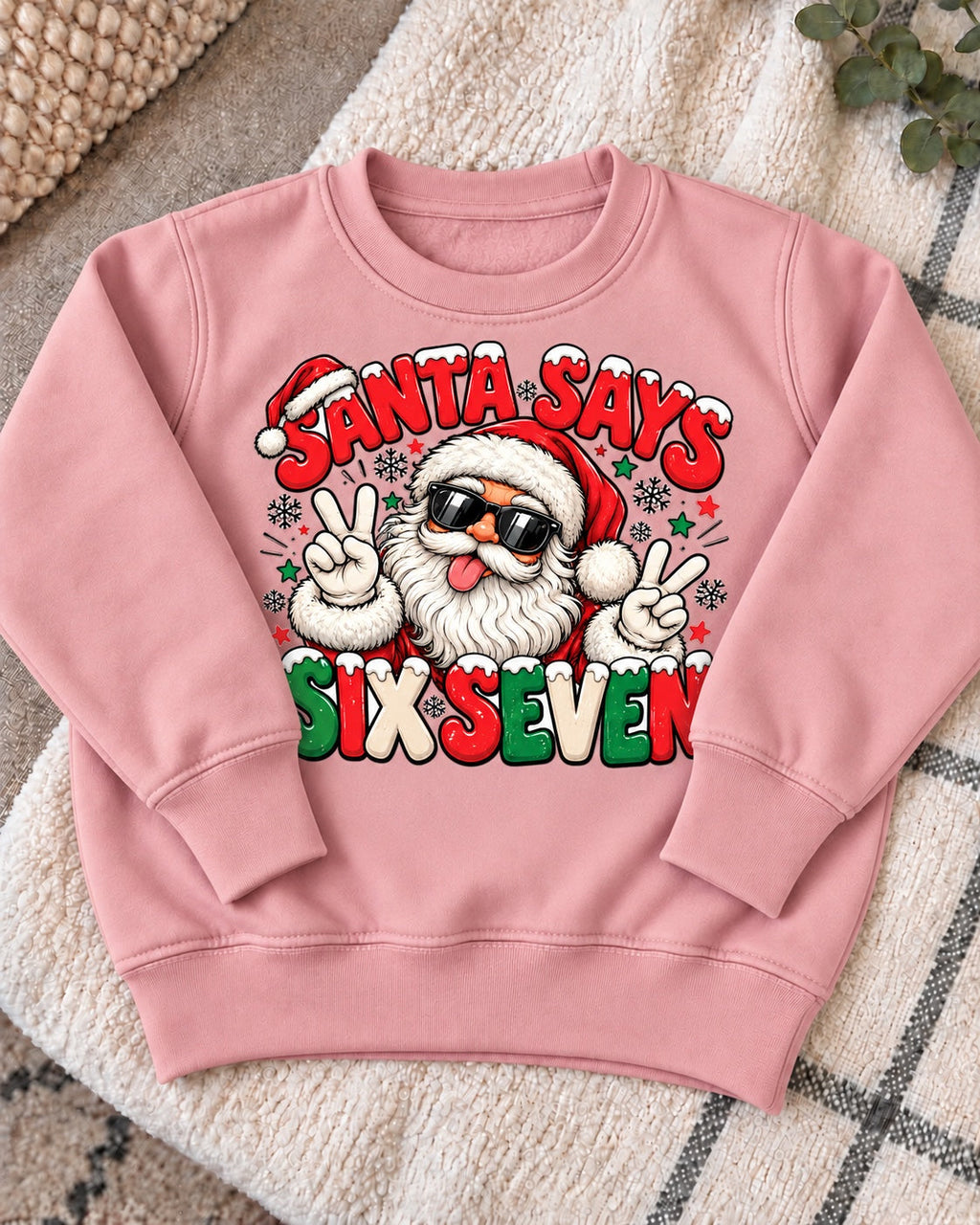 Santa Says Six Seven jumper - dusty pink flat lay