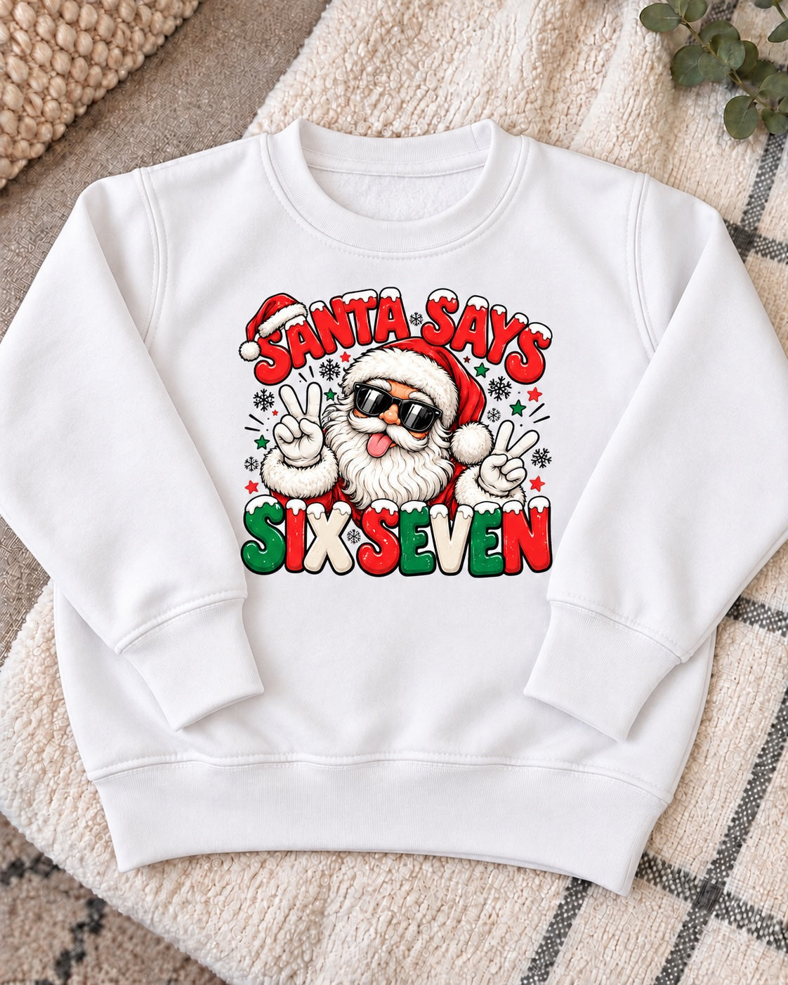 Santa Says Six Seven jumper - white flat lay